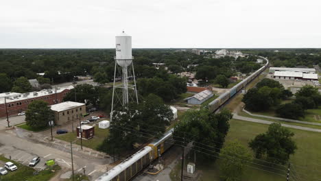 freight train passing through small texas town
