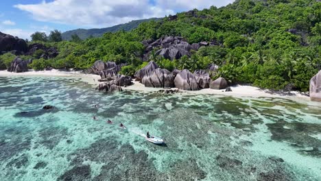 transparent kayak at la digue island in victoria seychelles. indian ocean landscape. beach paradise. la digue island at victoria. seascape outdoor. archipelago background. tourism travel.
