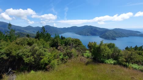 a panning shot of the stunning view from eatwell's lookout on the queen charlotte track in the south island of new zealand