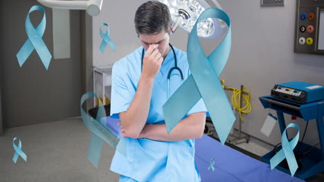 animation of cancer awareness blue ribbons over worried male caucasian doctor