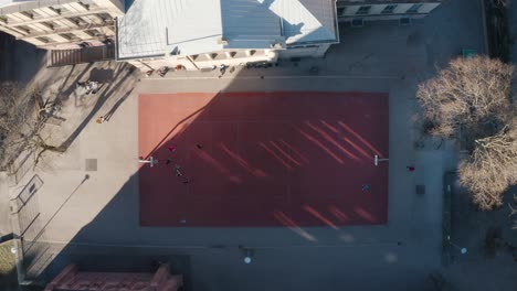 basketball court outdoor game video from above, drone shot, 4k