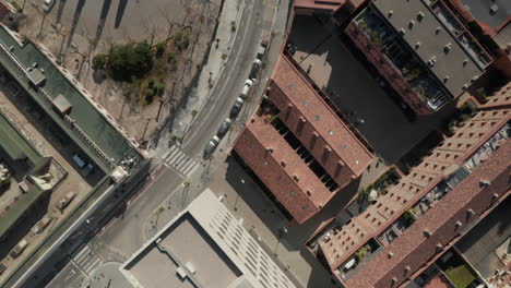 Birds-eye-shot-of-town-development-in-urban-borough.-Various-buildings-and-streets-in-city.-Barcelona,-Spain