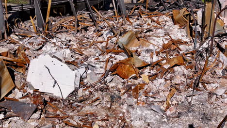 the devastation and rubble of a burnt building after a fire