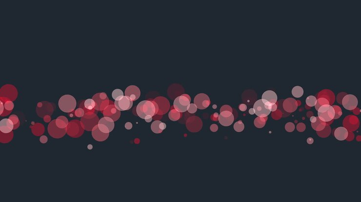 Bold red dots in linear formation against black background