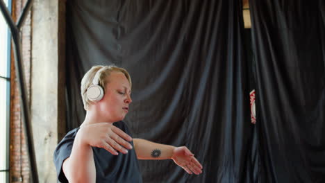 woman dancing indoors