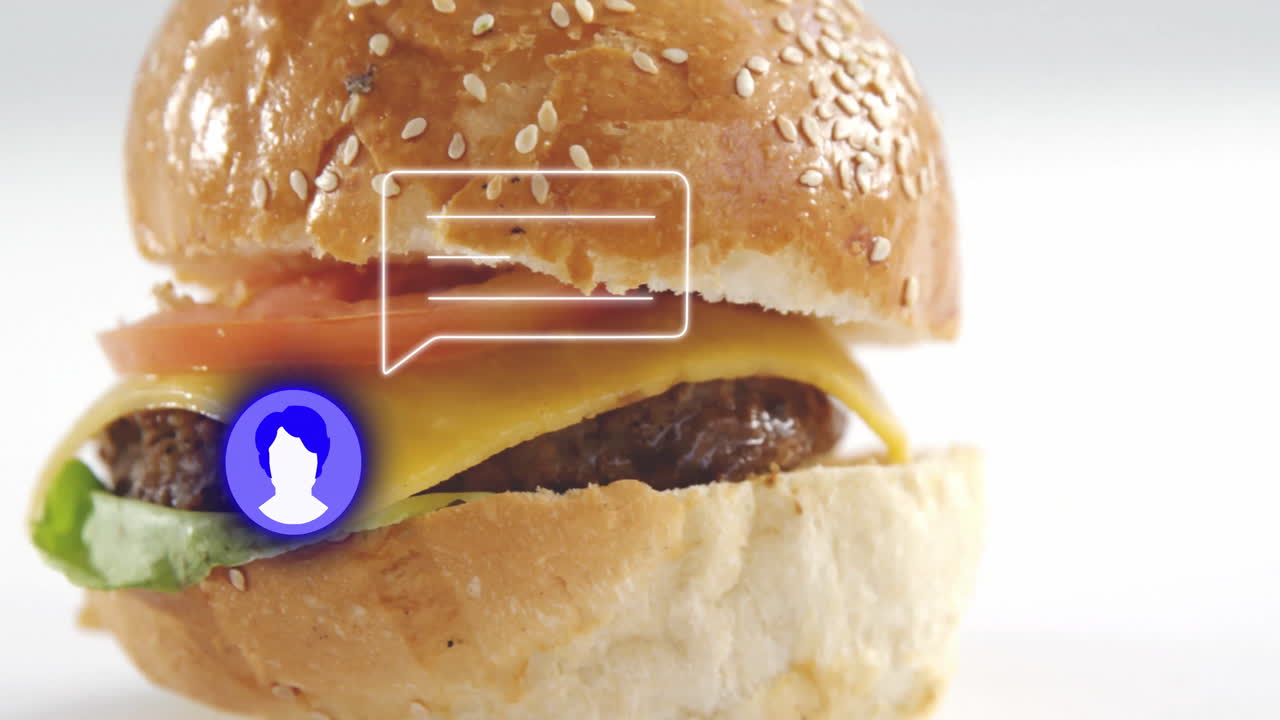 Burger with cheese and tomato overlaid with chat bubble and profile icon animation