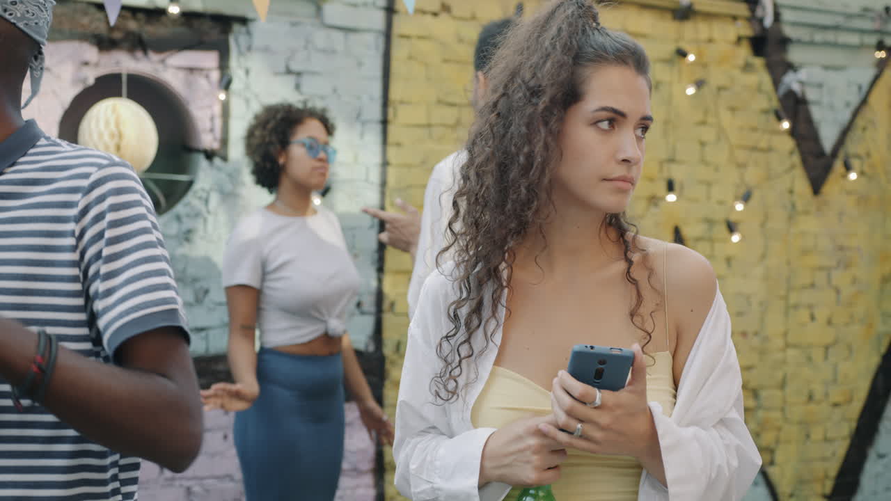 Friends having fun at an outdoor urban party