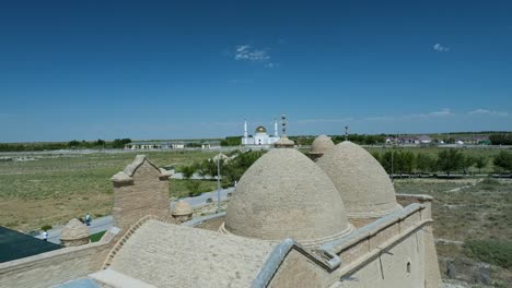 a view of arystan bab mausoleum in kazakhstan - aerial pullback