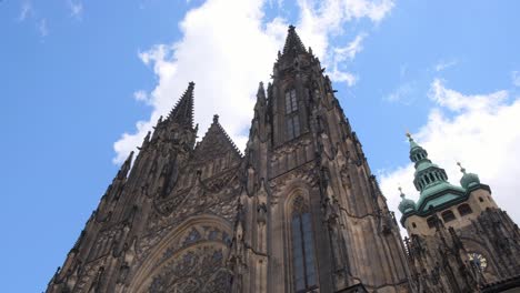 medieval gothic building with cloudgazing facade and spire