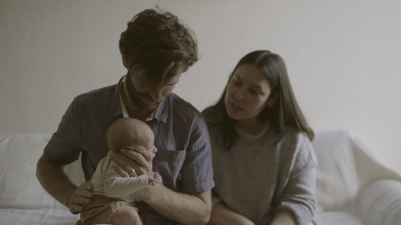 Happy Family with Newborn Baby