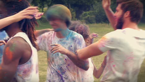 in high quality format happy friends throwing powder paint