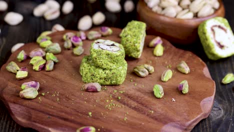 fresh turkish delight with green pistachios falls from a push with your hand