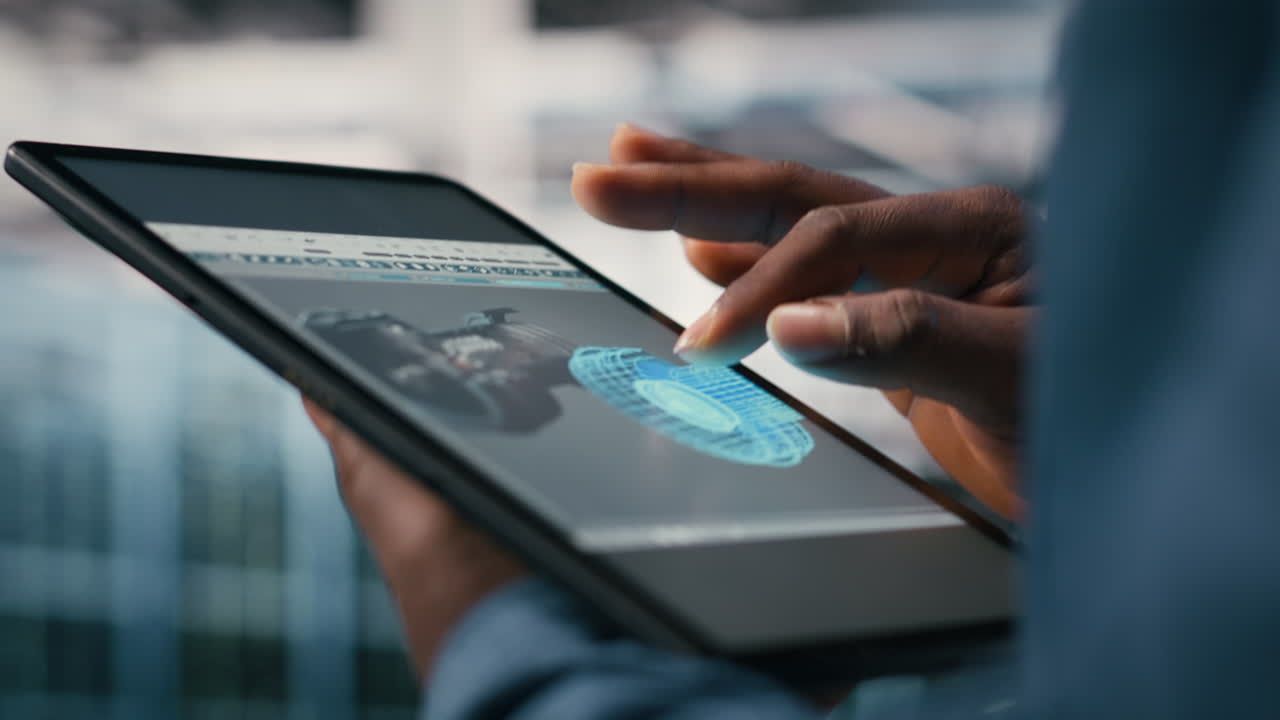 Close Up of Hands Interacting with 3D Digital Design on Tablet