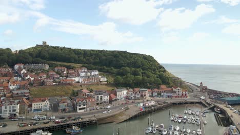 Aerial-bird's-eye-view-of-Scarborough-town,-beach,-harbour-and-castle