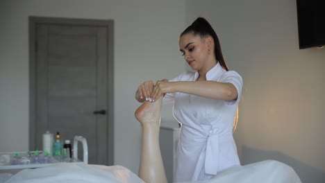 foot massage session at a spa