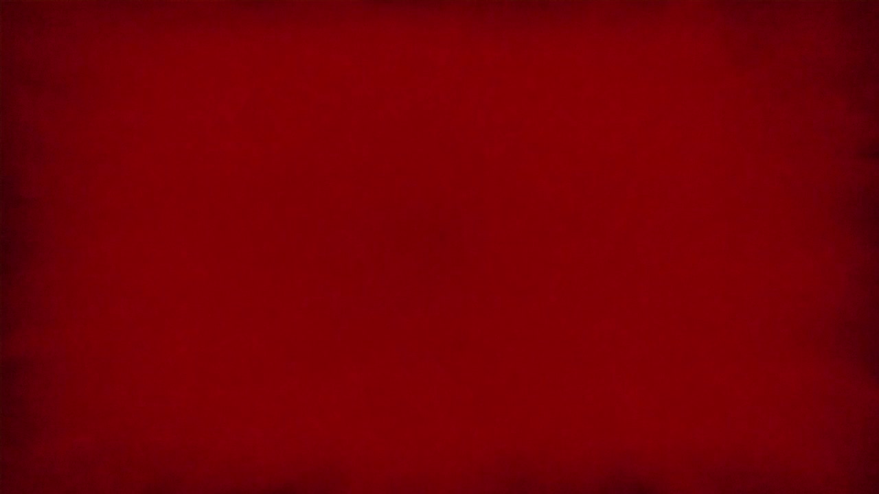Bagliore di luce rossa astratto che si espande e svanisce su sfondo nero