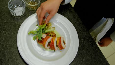 chef arranging bacon on a plate 4k