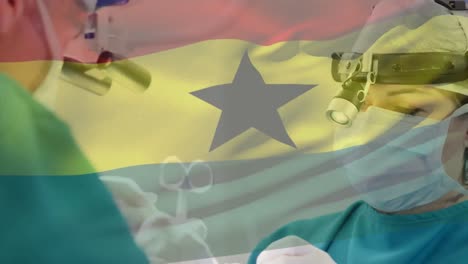 Animation-of-waving-ghana-flag-over-caucasian-female-surgeon-performing-surgery-at-hospital