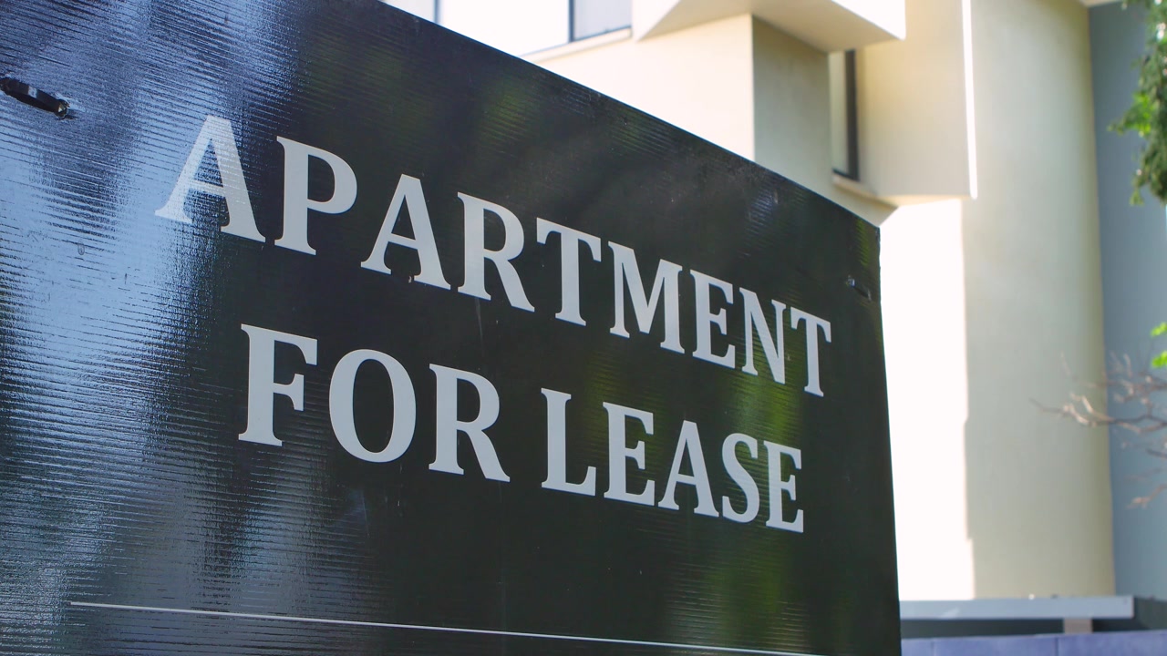 Apartment for lease signage in front of an apartment building, Brisbane, Australia.
