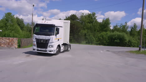 white semi-truck on the road