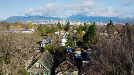 Stunning-Aerial-Reveal-of-Vancouver-and-the-Mountains-on-a-beautiful-sunny-day-in-UHD---drone-rising-wide-angle-panorama-flying-forward