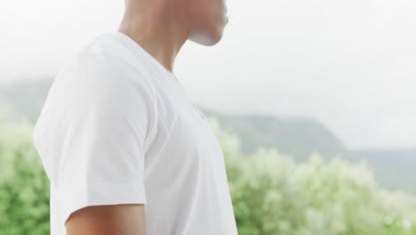 Slow-motion-video-of-african-american-man-wearing-white-t-shirt-with-copy-space