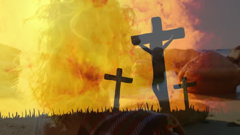 creating dramatic contrast, crosses silhouetted over fiery explosion background animation
