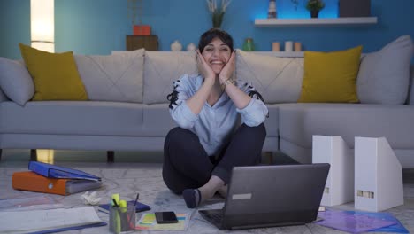 Home-office-worker-woman-making-cute-gesture-at-camera.