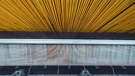fábrica de alfombras, producción de alfombras, hilos sintéticos para telar
