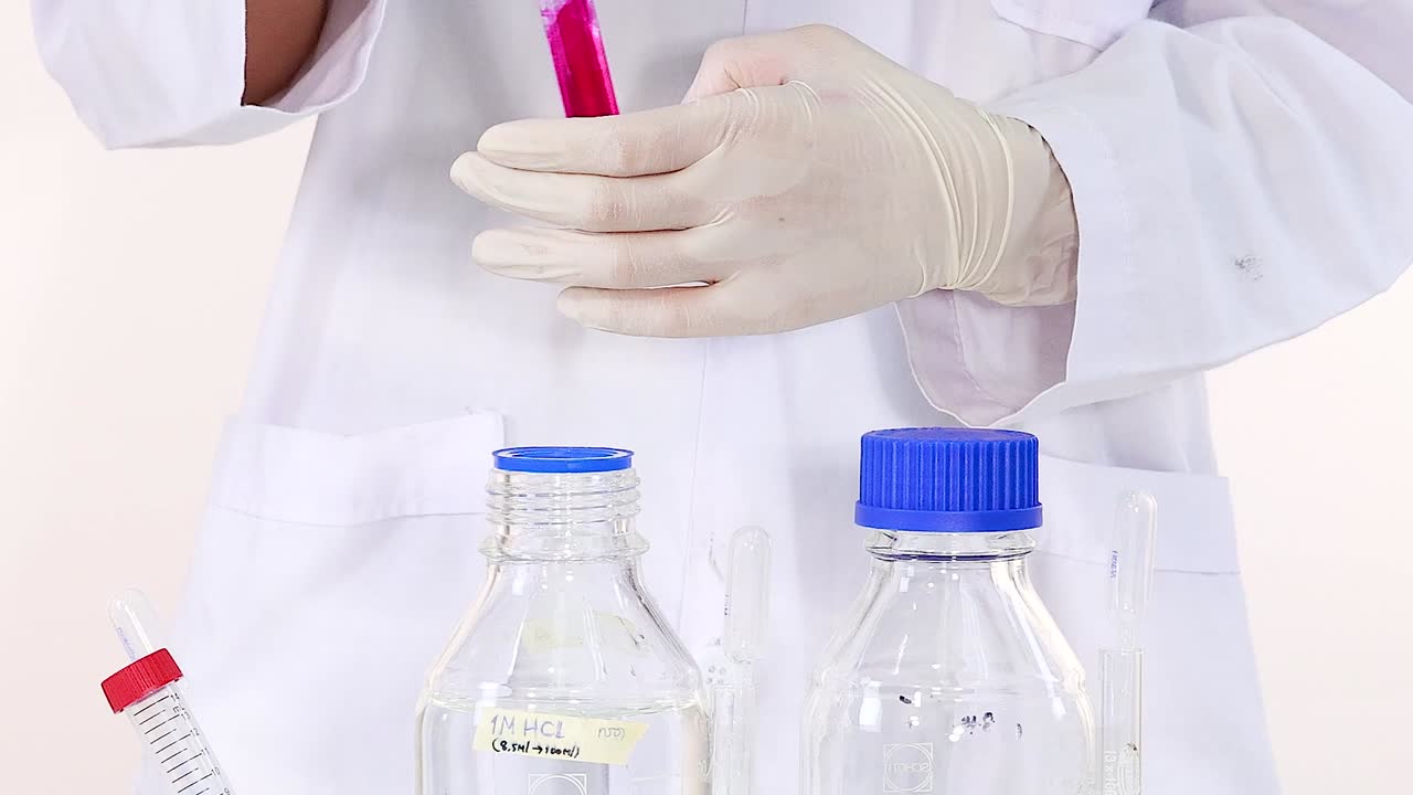 Scientist Performing a Chemical Experiment