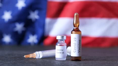 covid-19 vaccine with american flag