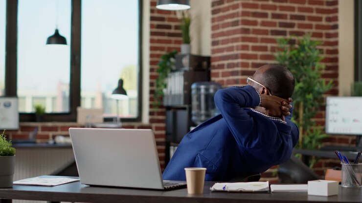 Project manager taking break from online company work