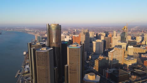 renaissance center and detroit river from above during golden hour, michigan, usa