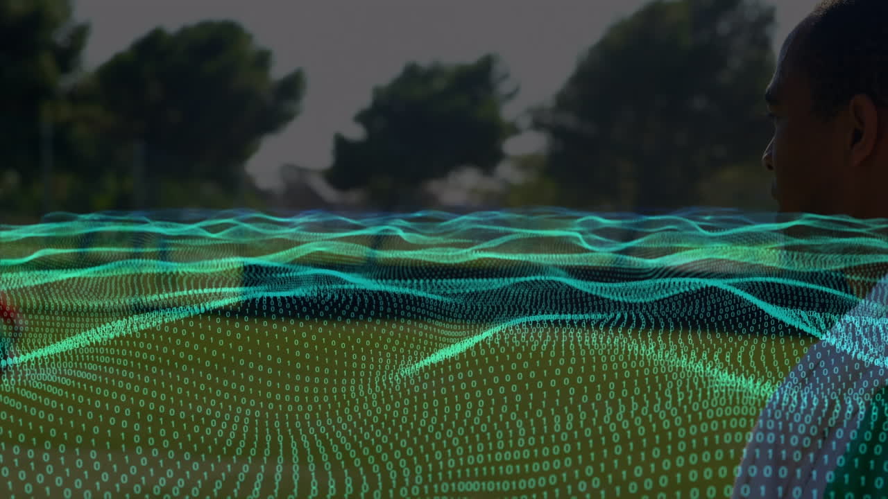 animación de ondas con codificación binaria sobre diversos jugadores de fútbol en el estadio