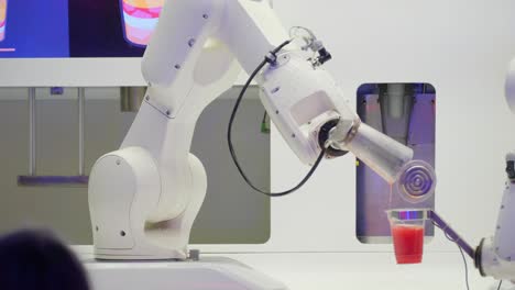 a robot mixes cocktails for patrons at an automated bar in prague czech republic a robot mixes cocktails for patrons at an automated bar in prague czech republic