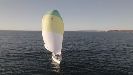 Sailboat-With-Gennaker-Cruising-In-The-Sea