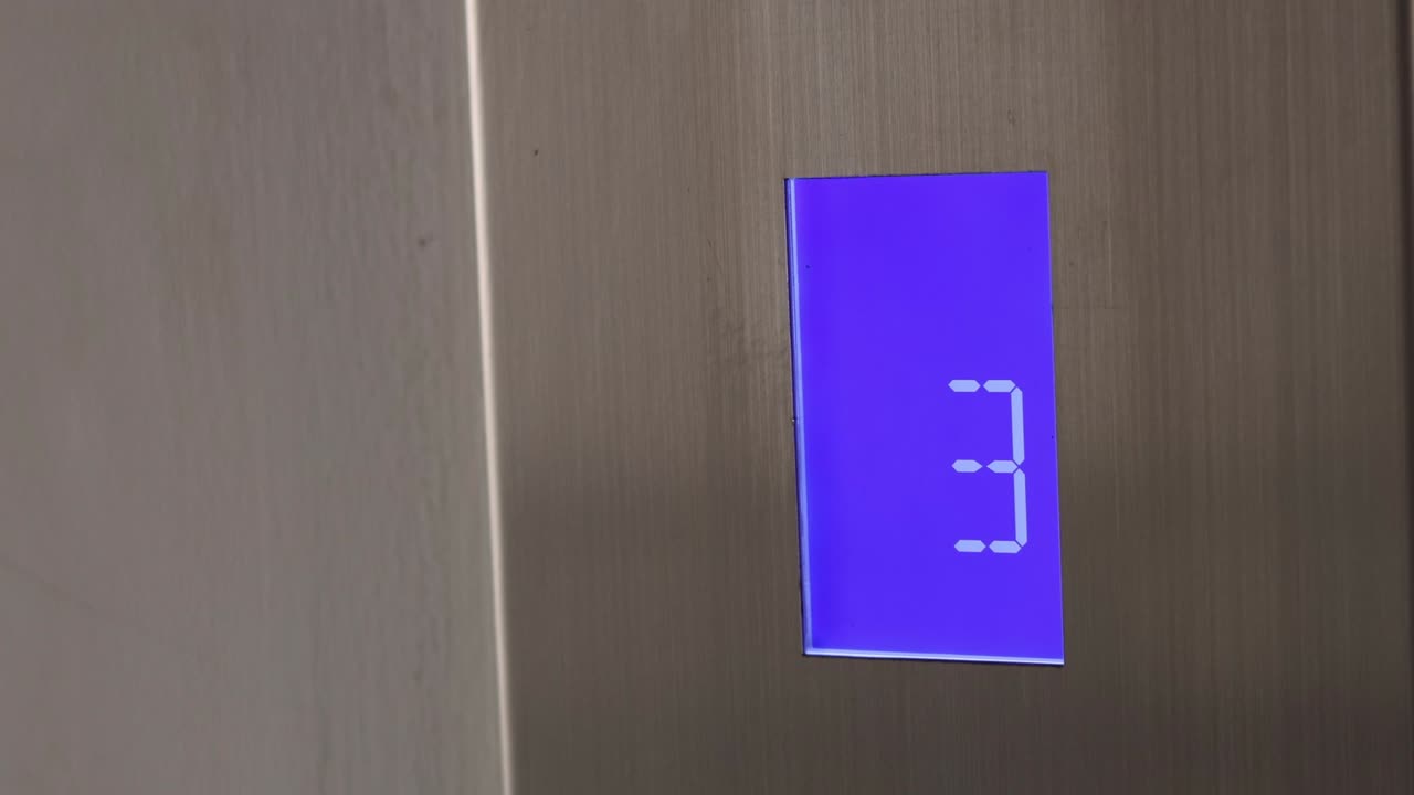 Digital elevator display counting up floors