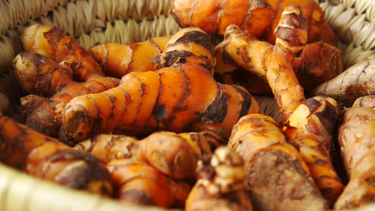 Turmeric Roots in a Basket