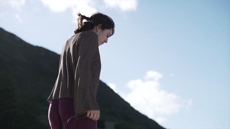 a woman in a natural landscape