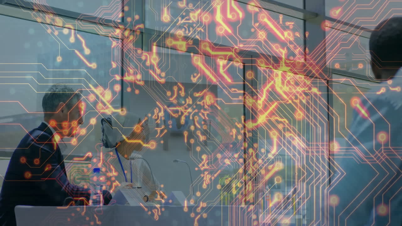 Working in modern office, people with circuitry animation overlaying workspace