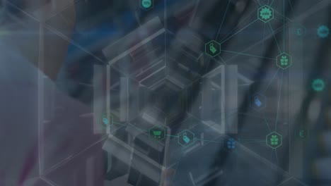 network of digital icons and hexagonal tunnel against caucasian businesswoman using smartphone