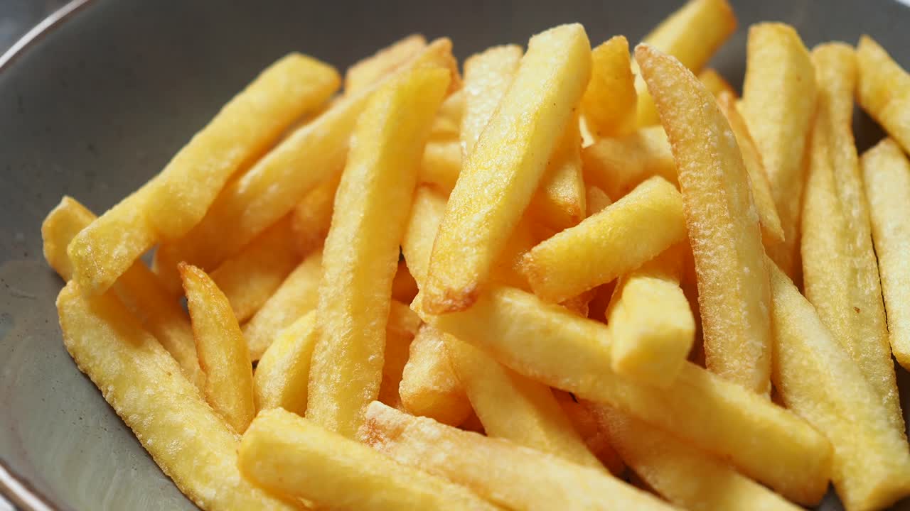 Detail shot of french fries on table