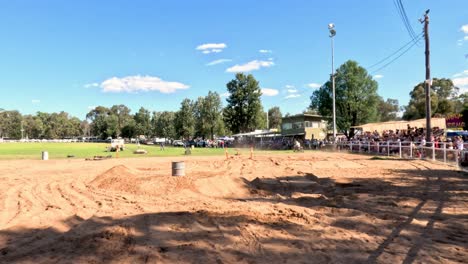 motorcyclist competes in a dirt track race