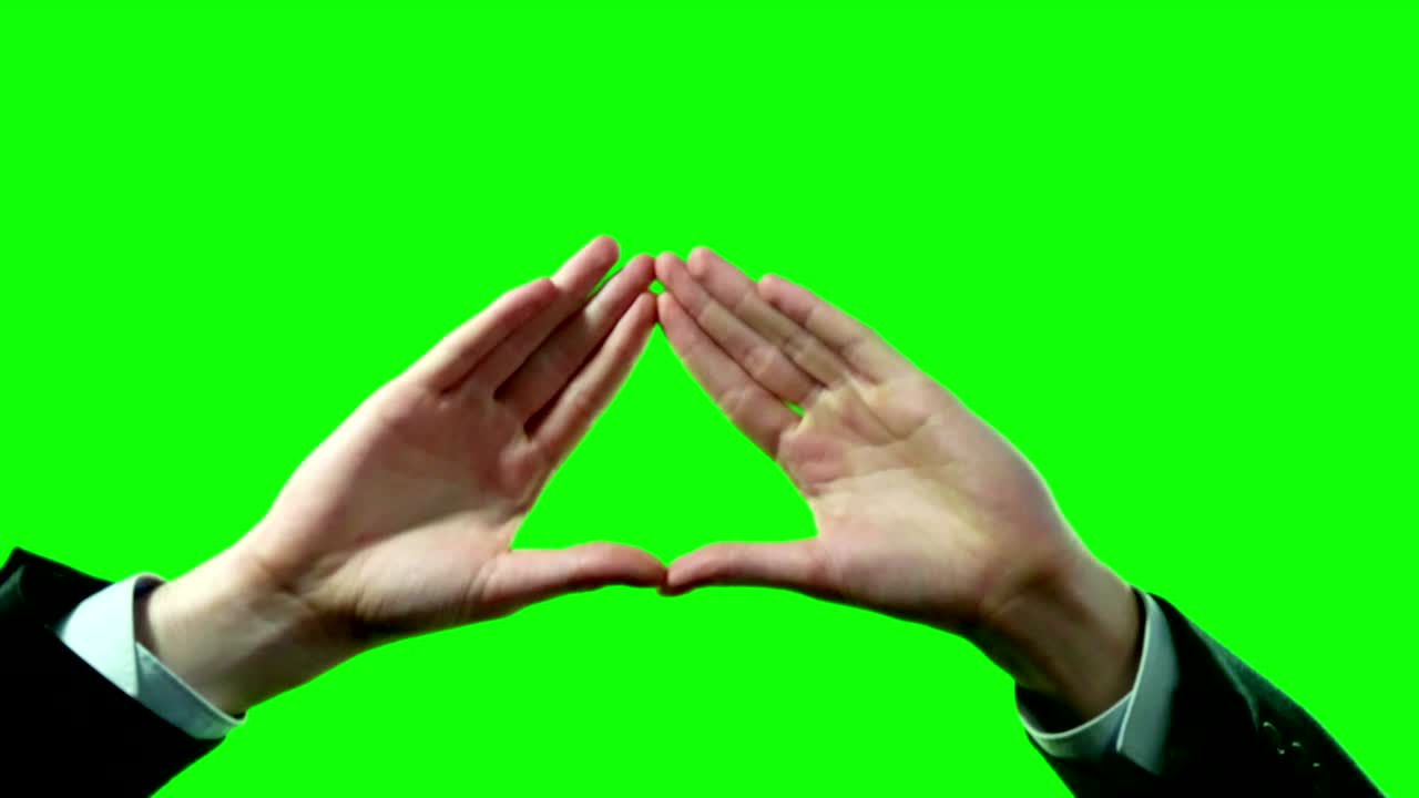 피라미드 삼각형 기호는 비즈니스맨이 녹색 스크린 4k 비디오 세트에 손을 습니다.