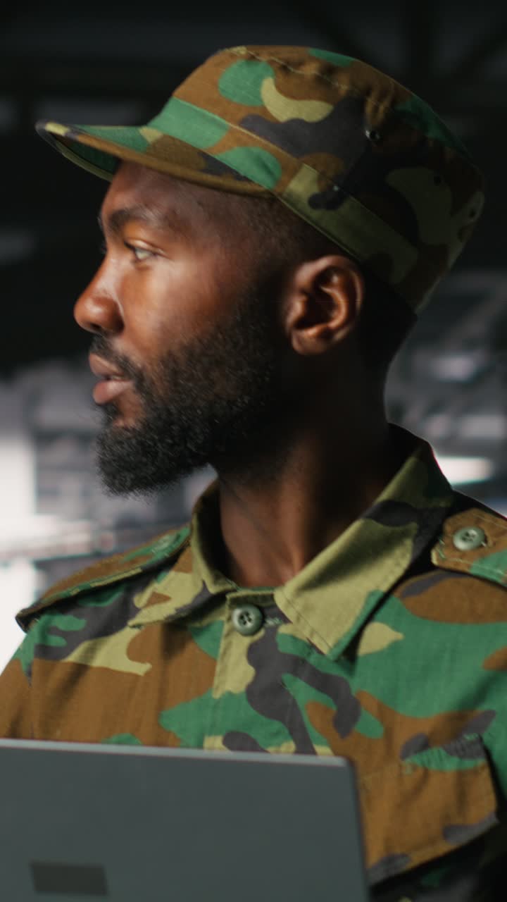 Vertical video Army information technology specialist in data center troubleshooting systems