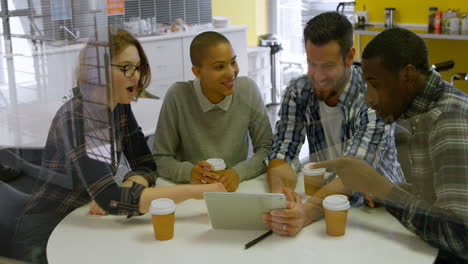 young biracial business team discussing over digital tablet in modern office 4k