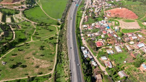 Bird's-eye-view-dolly-in-of-route-68-Santiago-Valparaíso,-Chile