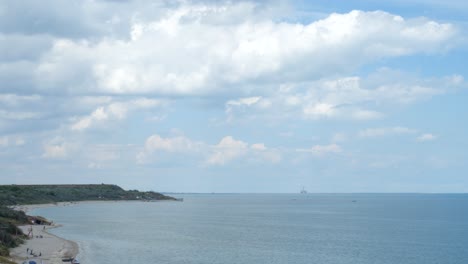 Static-Aerial-View-on-Black-Sea-Shoreline-with-Seagull-Flying-Over