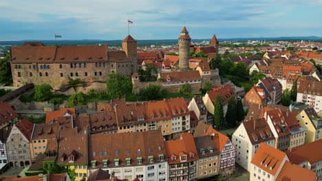 4k aerial drone video of the imperial castle and albrecht dürer house art museum in downtown nurnberg, germany