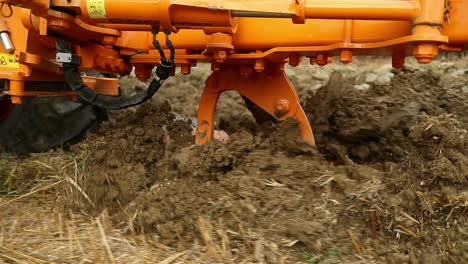 dig trenching using a multiple furrow plow at rural macerata italy